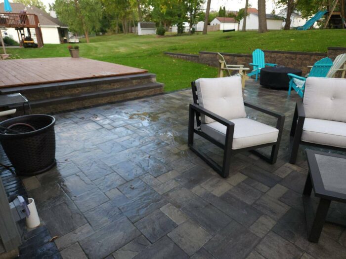 Paver Patio with Retaining Wall after photo of paver patio with retaining wall landscaping project