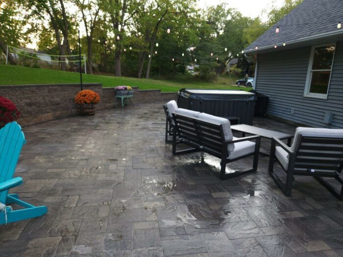 Paver Patio with Retaining Wall after photo of paver patio with retaining wall landscaping project
