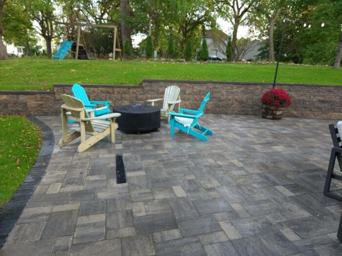Paver Patio with retaining Wall after photo of paver patio with retaining wall landscaping graphic